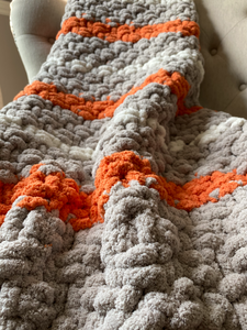 Chunky Knit Tassel Blanket | Gray and Orange Striped Tassel Blanket - Hands On For Homemade